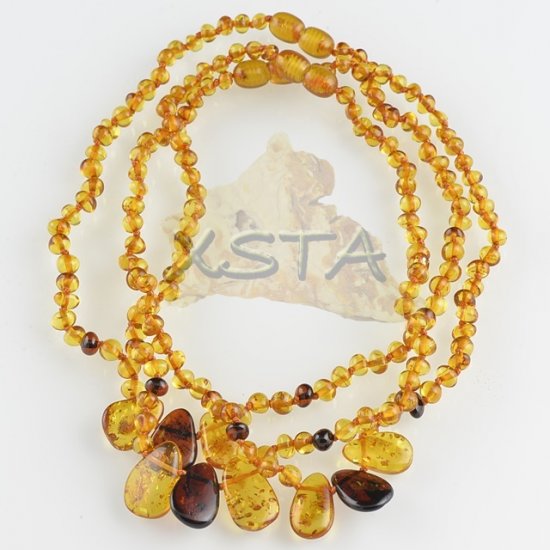 Teething baby necklace honey with amber leaves
